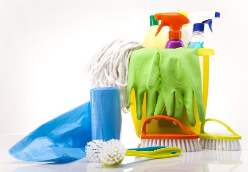 Protective gloves and cleaning equipment prepared for a safe job